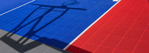 basketball hoop shadow on a basketball court